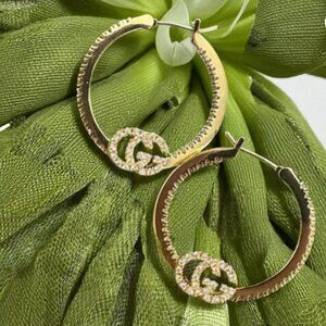 Gold Tone Hoop Earrings With Crystal Double Letter Design